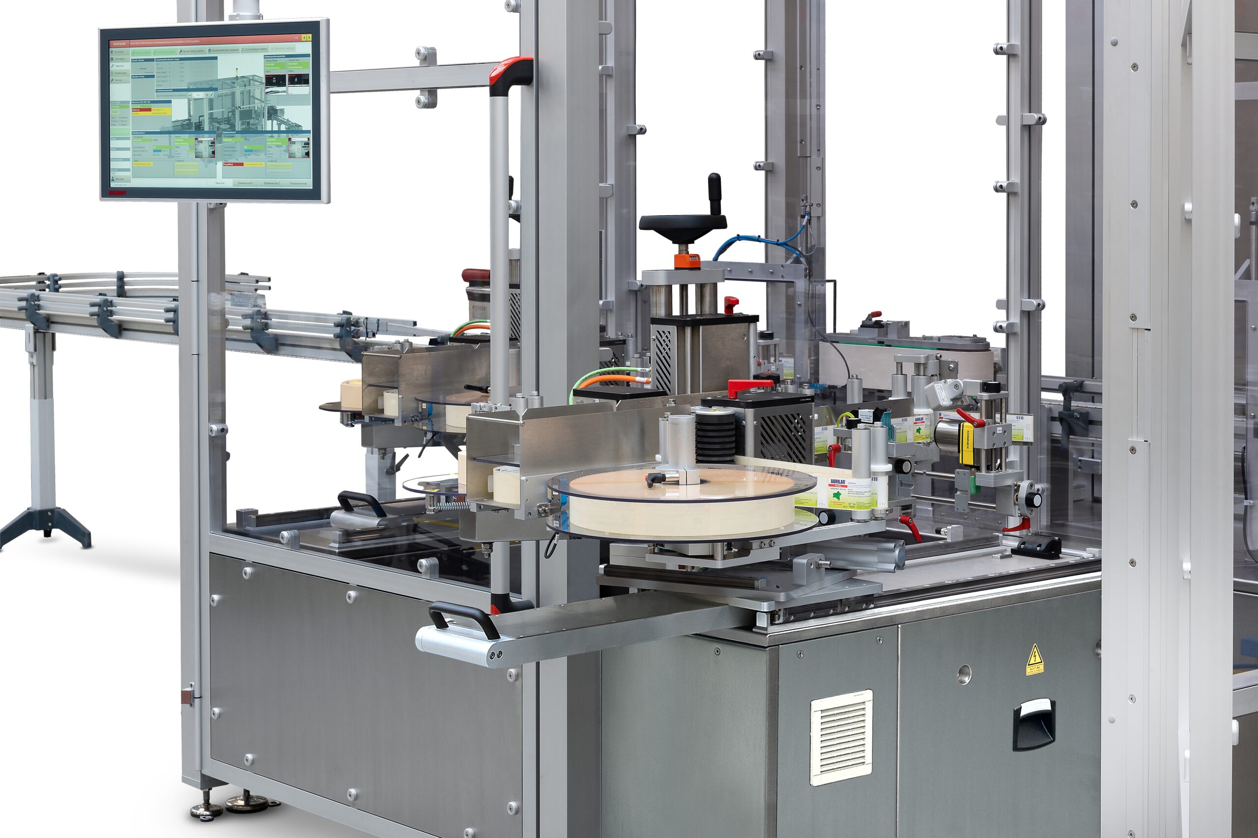 Non-stop wrap around etikettering